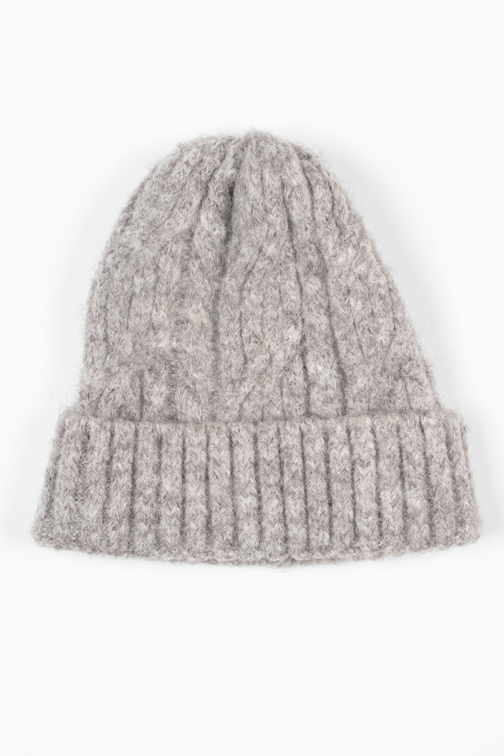showing the grey beanie hat laying flat, the bold cable knit design is shown, the hat also has a ribbed brim.