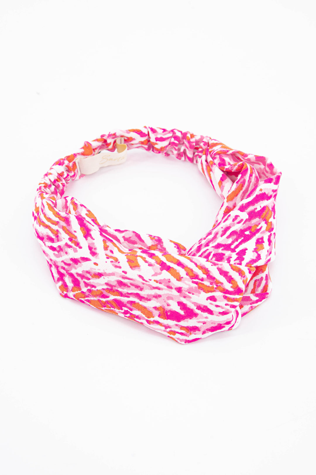 pink and white painted chevron pattern fabric headband with twist front and elasticated back