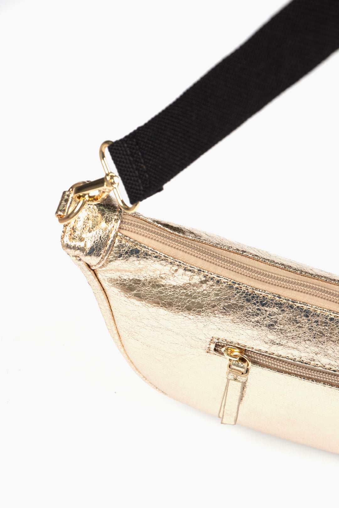showing the top zipper compartment and a smaller side pocket which is also has a zip closure.