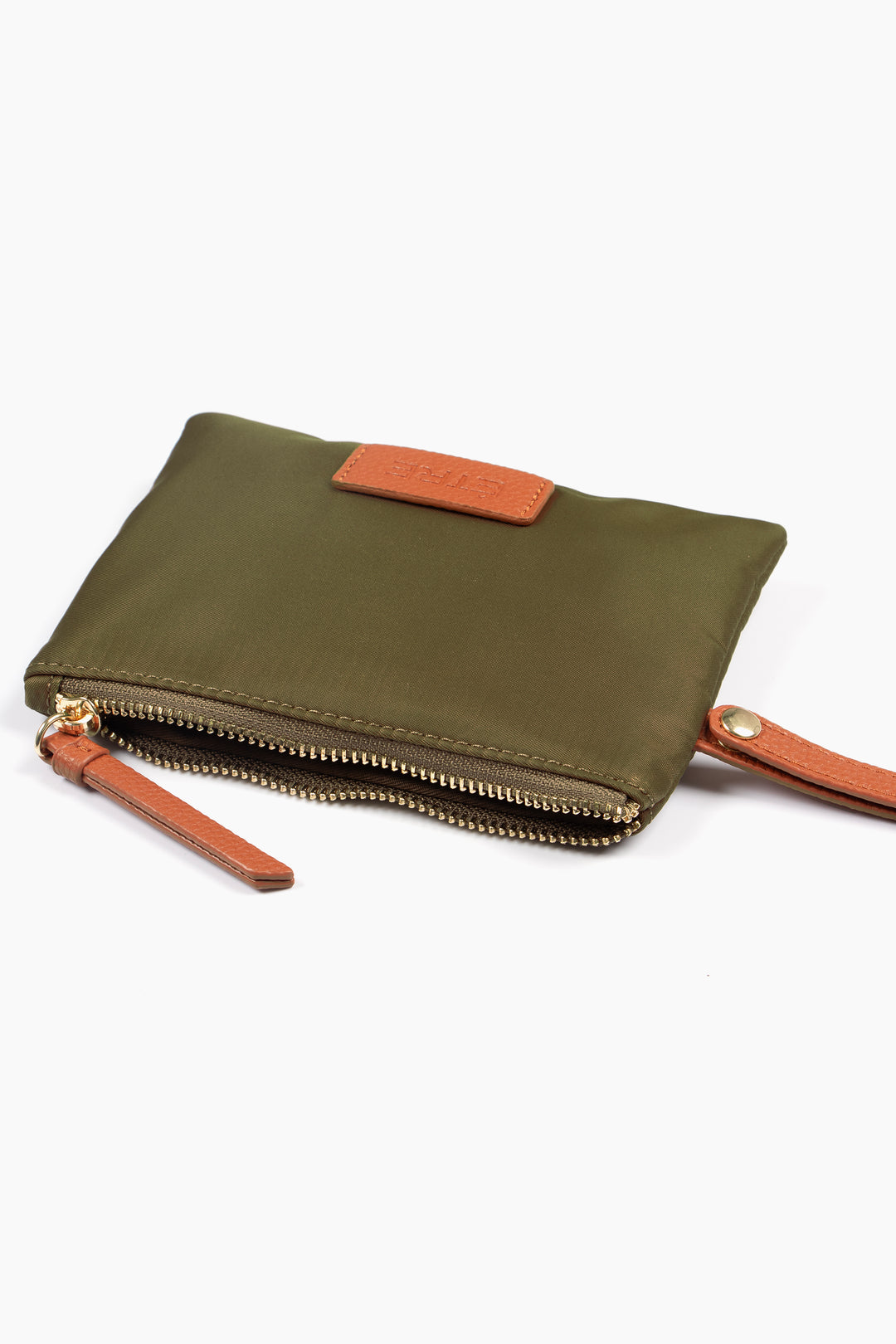 showing the purse laying flat, the zip is open showing a single compartment.