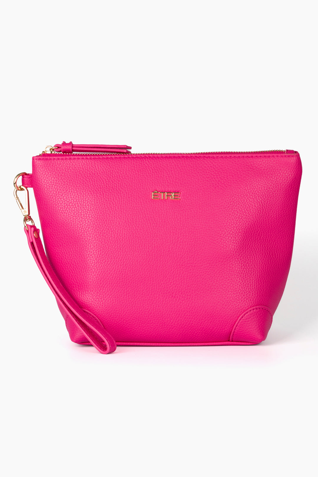 fuchsia pink faux leather vanity bag with a detachable wrist strap and top zip closure