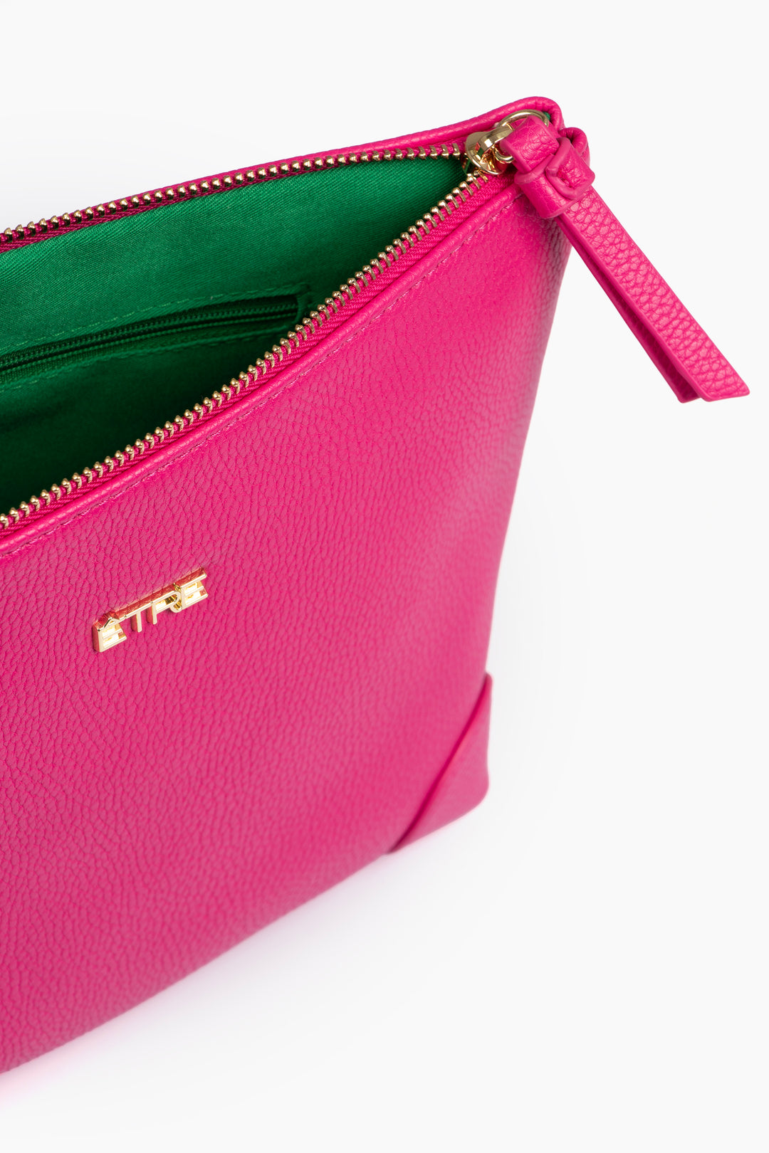 showing the bag unzipped, there is an internal pocket visible