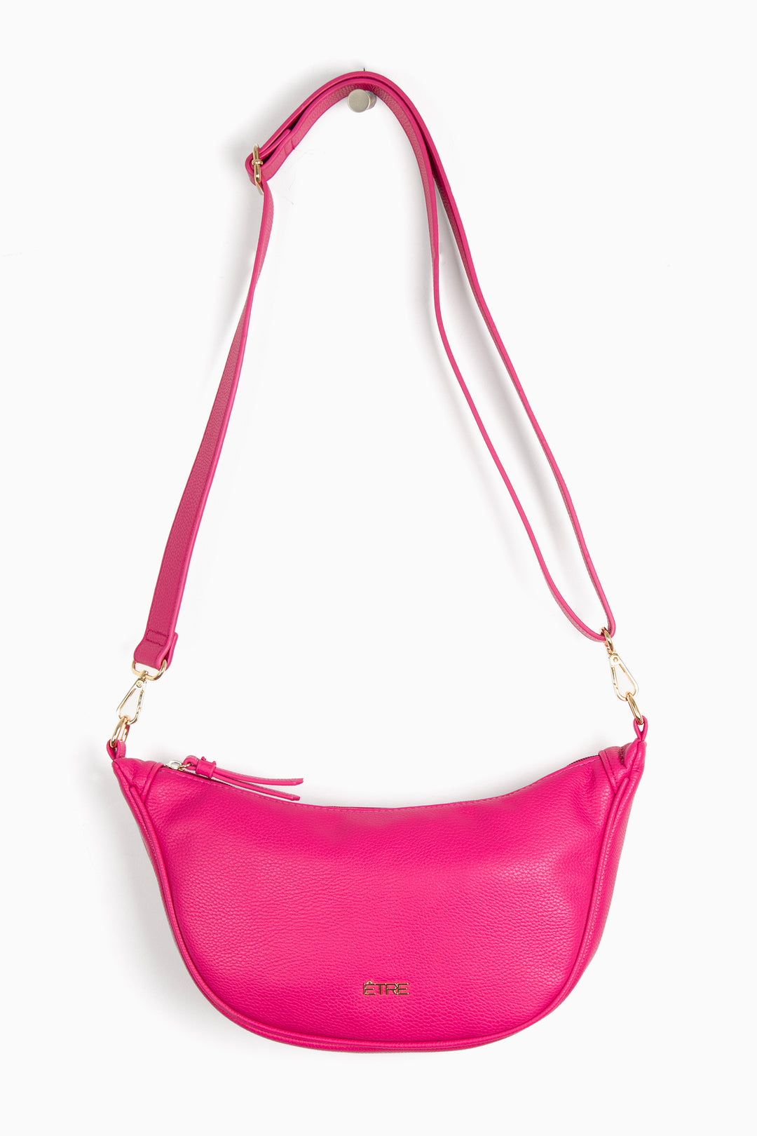 fuchsia pink faux leather crossbody half moon sling bag with detachable bag strap