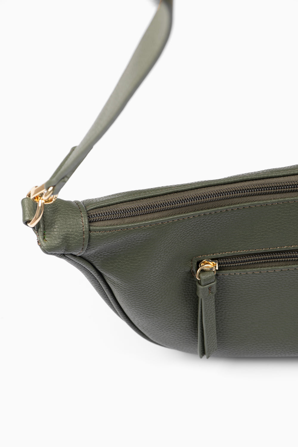 showing the top zipper compartment and a smaller side pocket which is also has a zip closure.