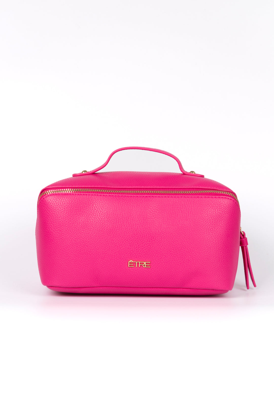 fuchsia pink faux leather vanity case with a top handle. the cosmetics bag has zip fastening closure.