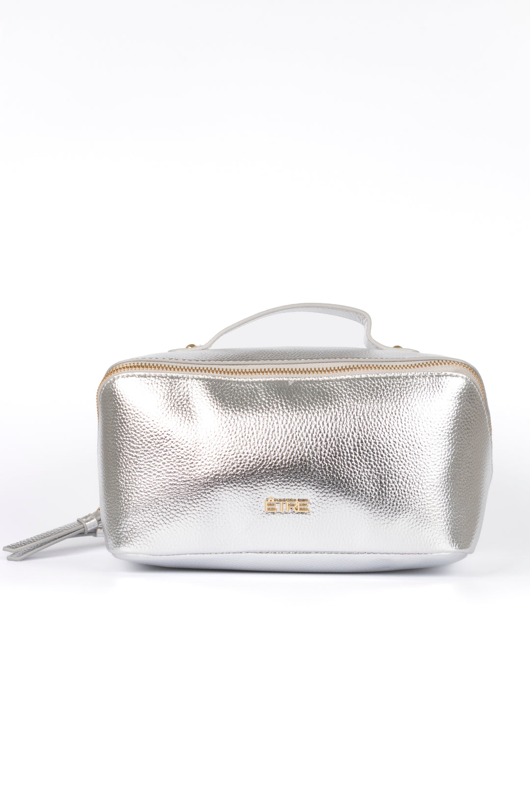 metallic silver faux leather vanity case with a top handle. the cosmetics bag has zip fastening closure