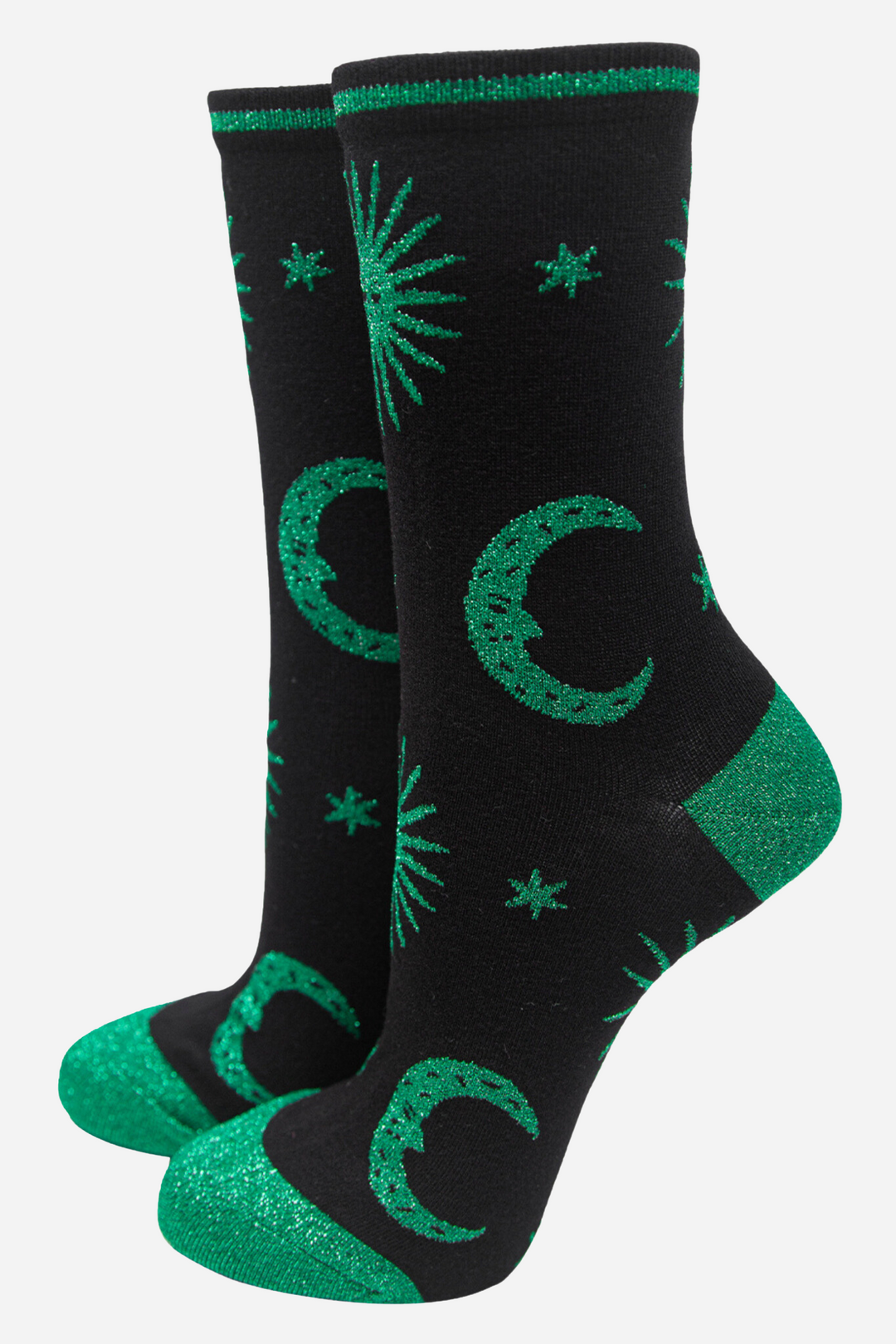 black socks with green, stars, crescent moons and suns with green sparkly glitter accents