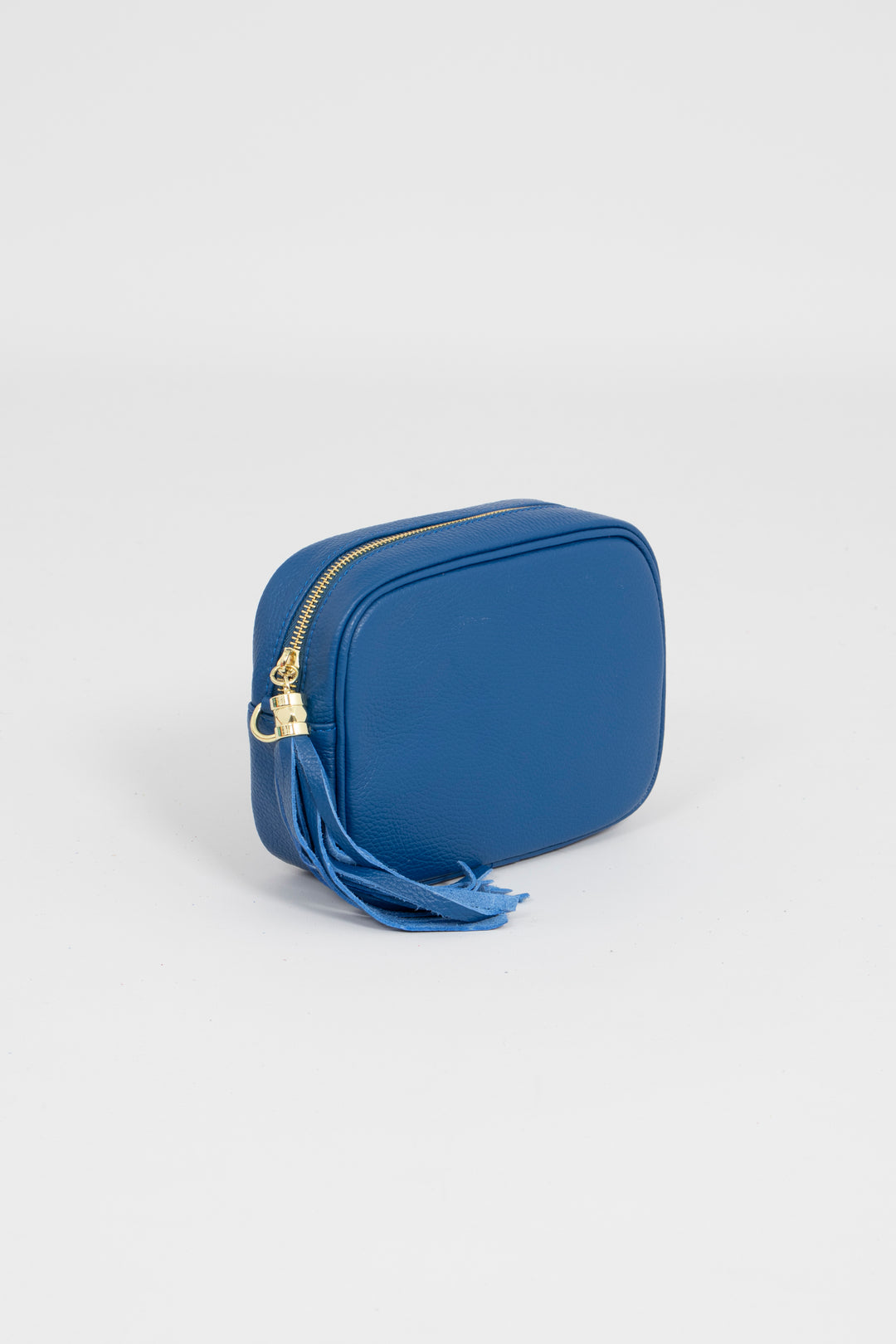 close up showing zip of the of blue crossbody camera bag