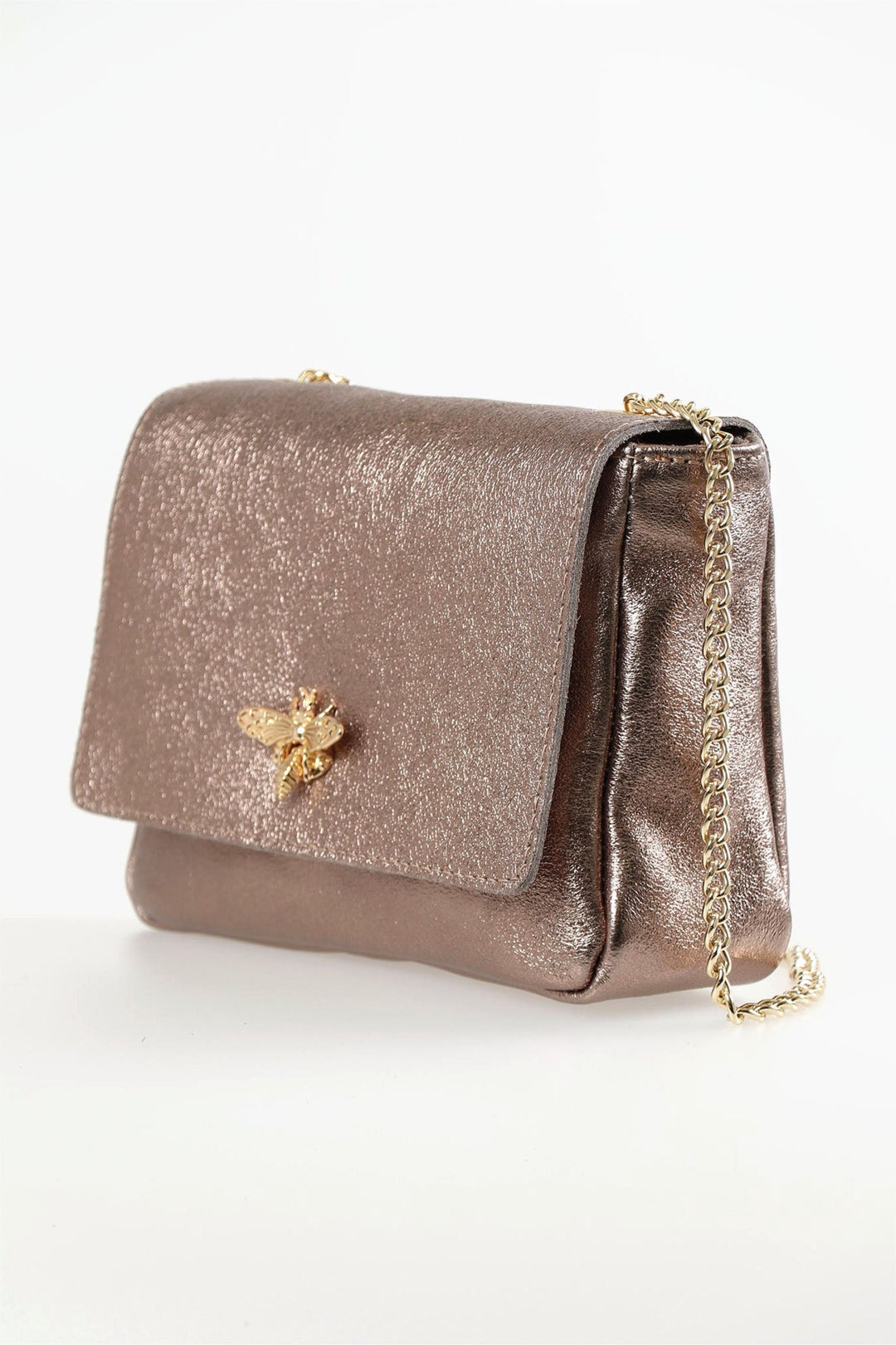 close up of the gold cuban chain strap and bee clasp