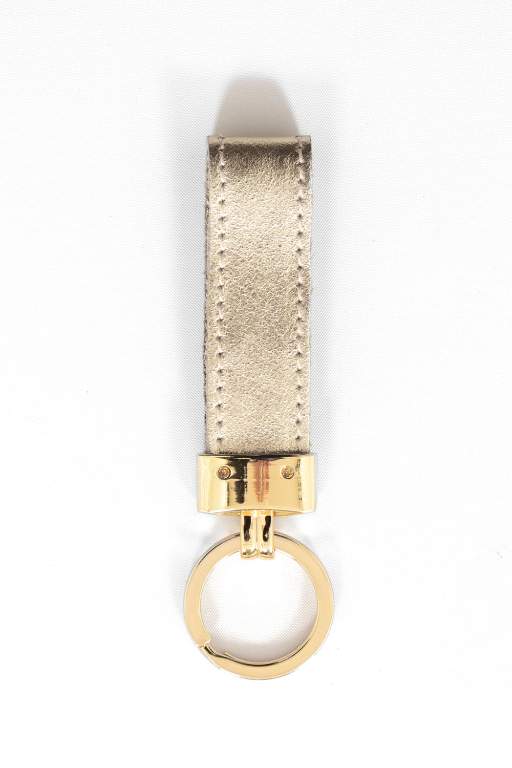 metallic gold leather loop keyring with a gold loop attachment.