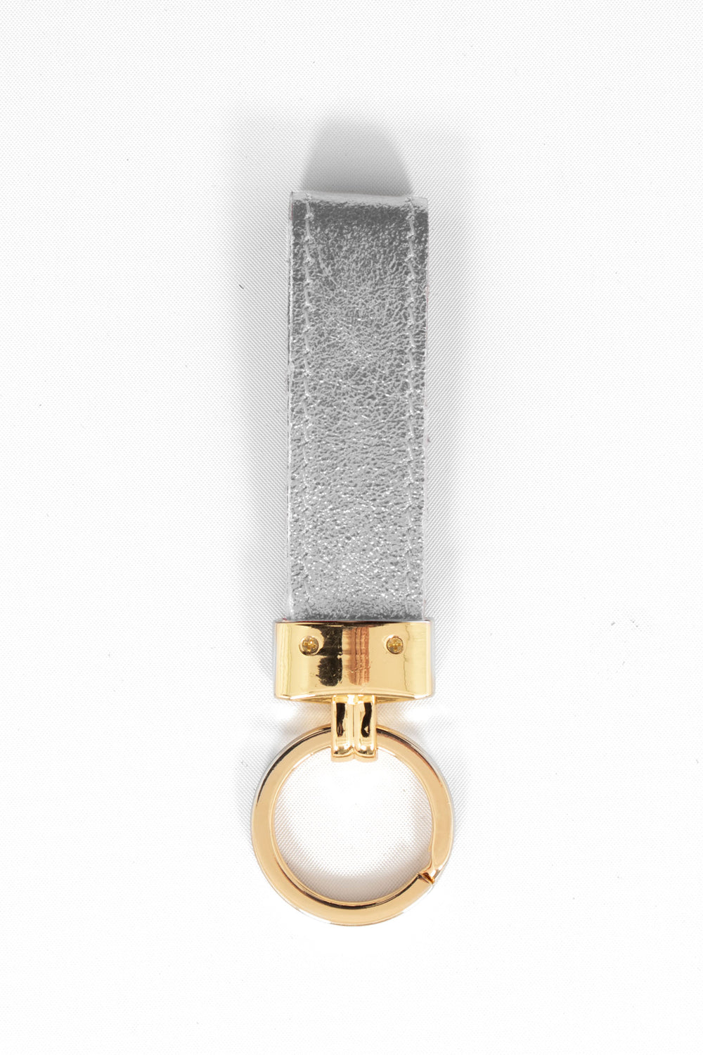 metallic silver leather loop keyring with a gold loop attachment.