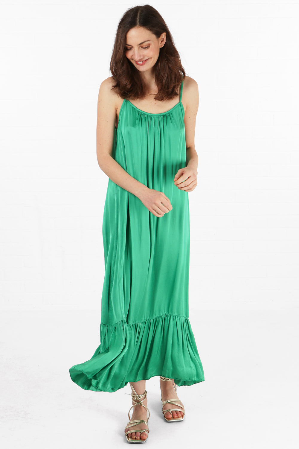 plain green maxi sundress with thin shoulder straps and a loose fitting design