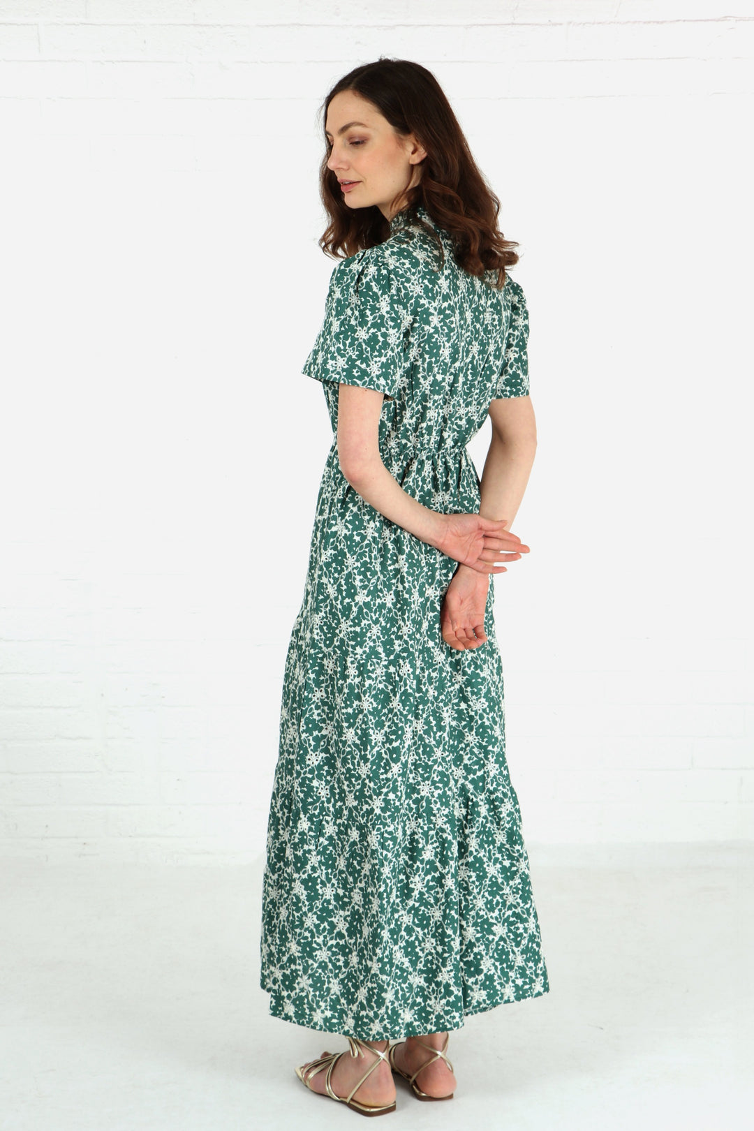 model showing the back of the dress showing an elasticated waist