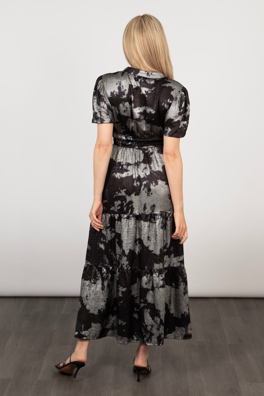 model showing the elasticated waist on the back of the dress