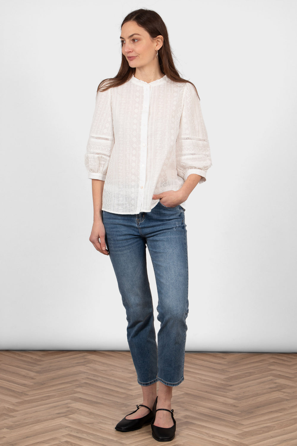 cora-cotton-3-4-sleeve-shirt-white-floral-embroidery-styled-with-blue-jeans-black-pumps