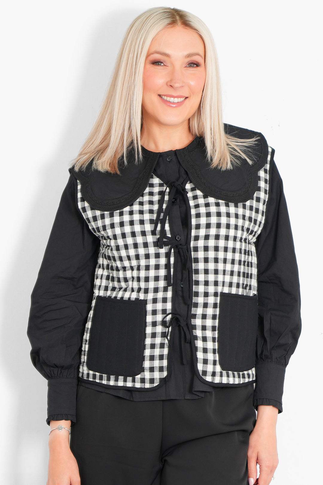 tabby-quilted-reversible-gilet-black-cream-gingham-front-ties
