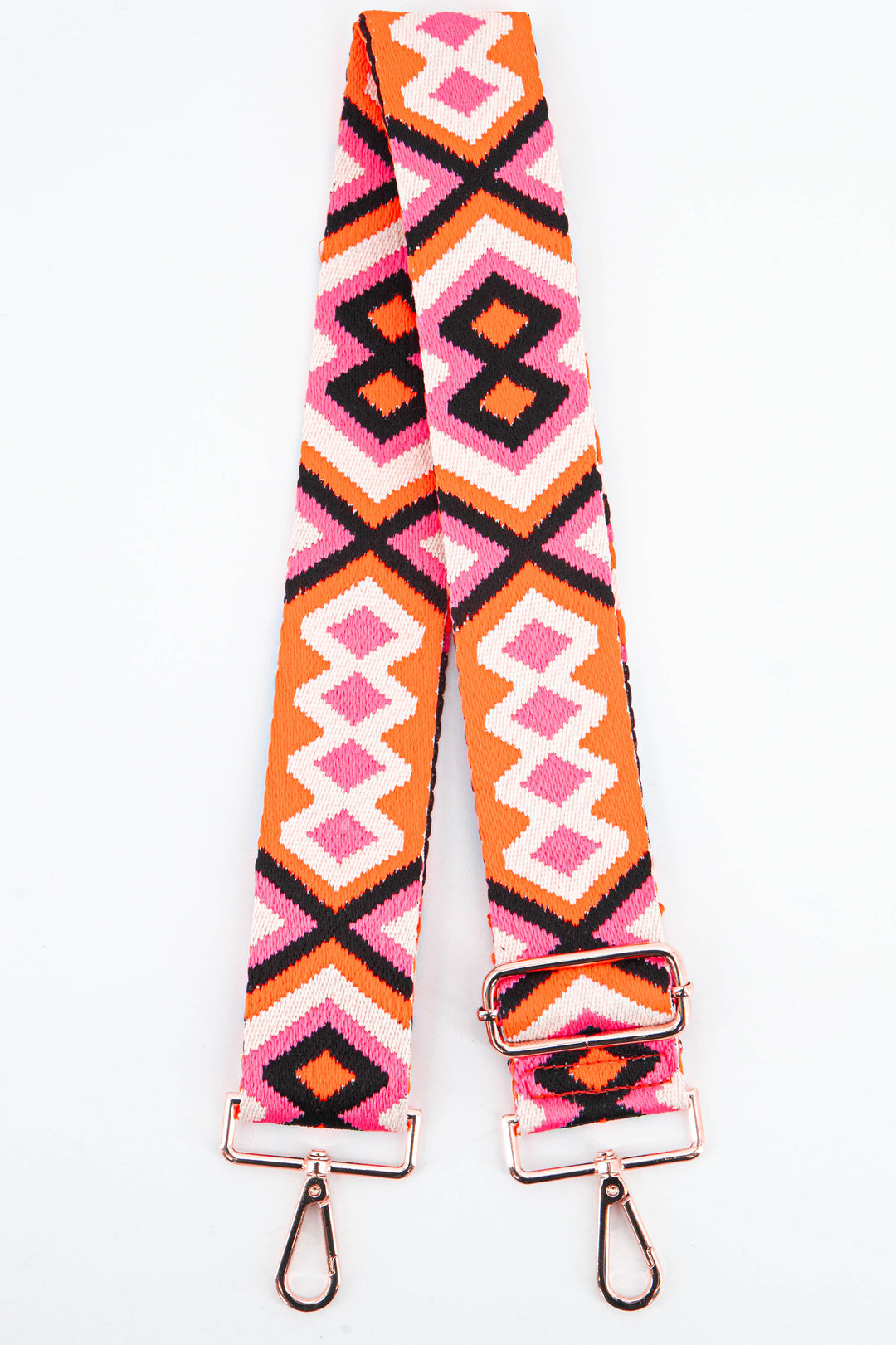 pink and orange aztec print woven clip on bag strap with gold hardware