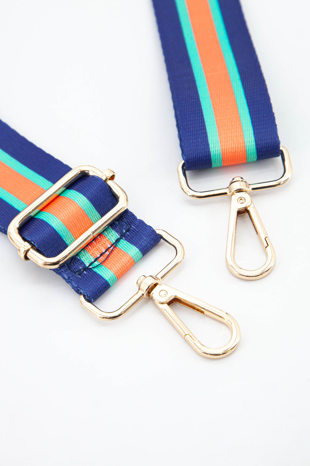 close up of the gold snap hook clip on attachments