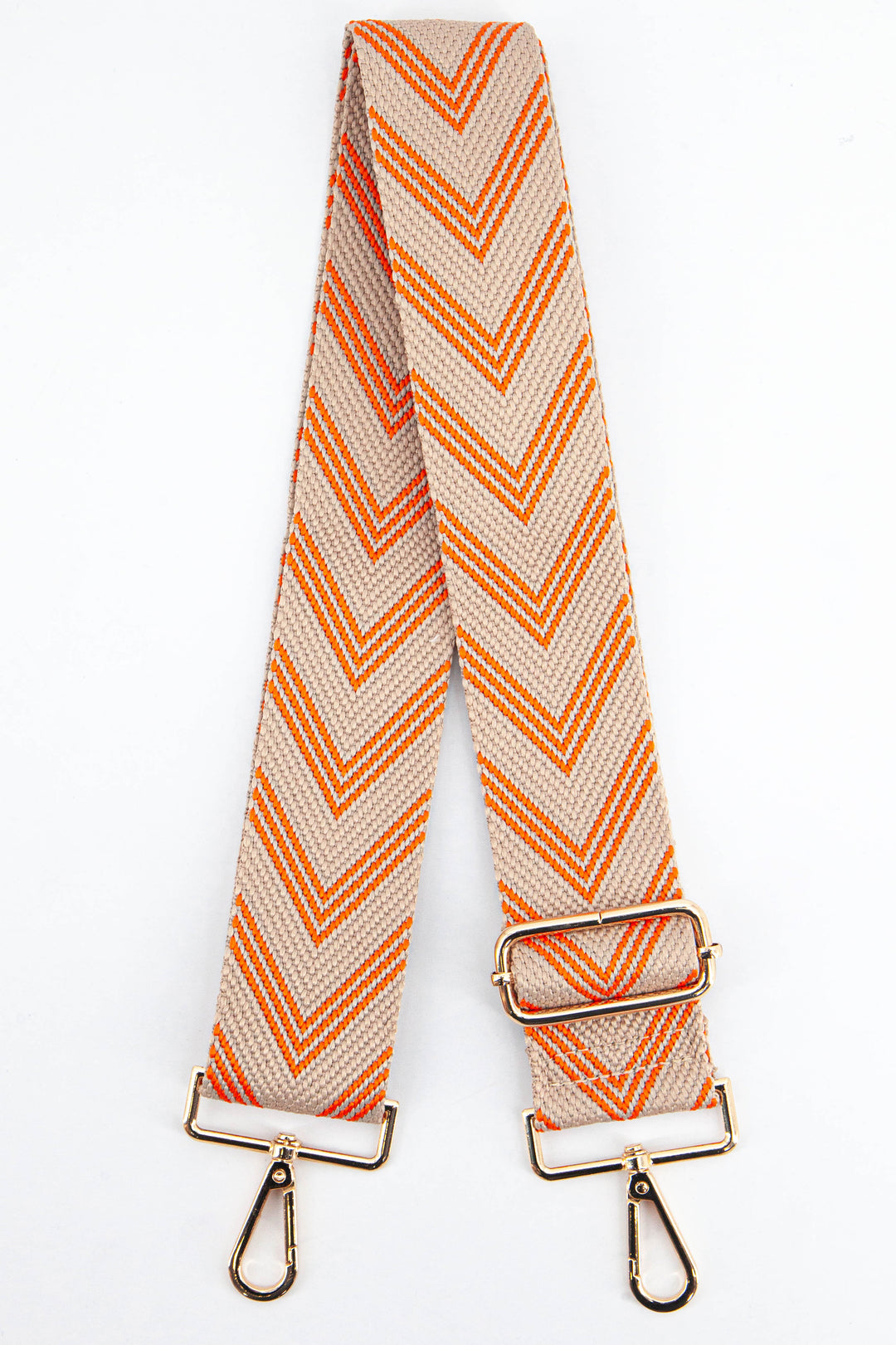 orange and beige woven chevron pattern adjustable bag strap with gold snap hook attachments