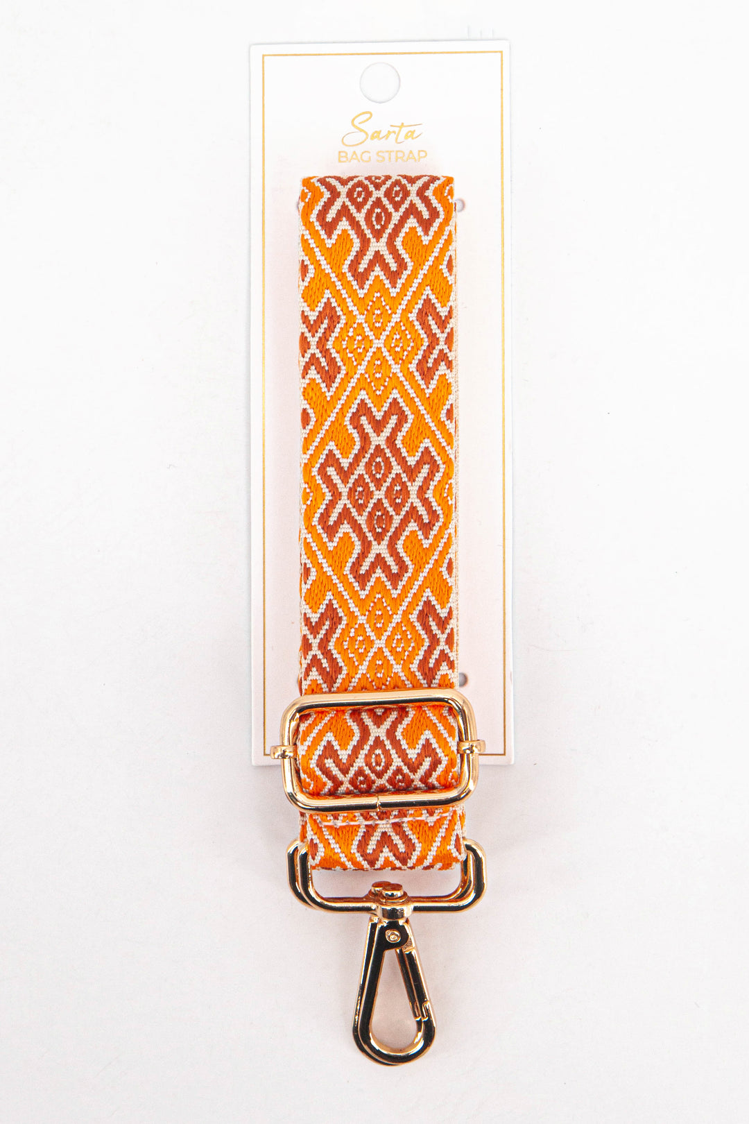orange jacquard woven bag strap in its sarta packaging