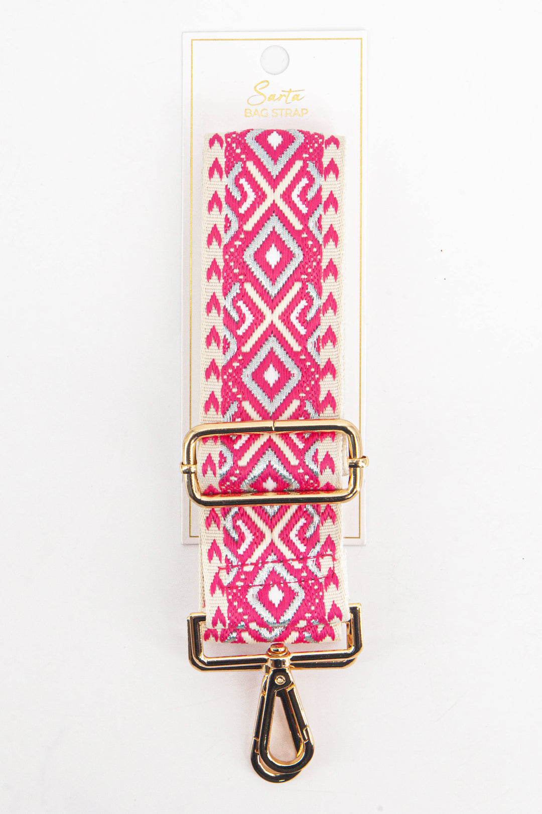 pink and silver geometric pattern woven bag strap in its sarta packaging