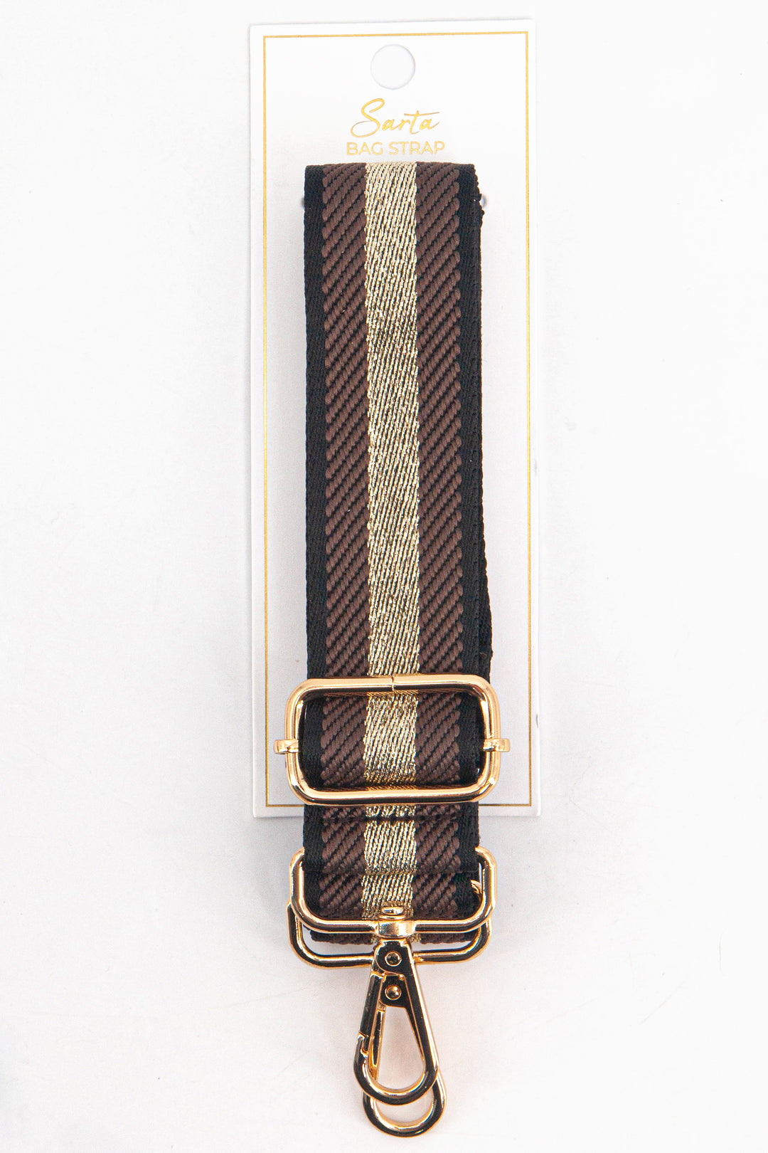 tan and gold glitter stripe woven bag strap in its sarta packaging