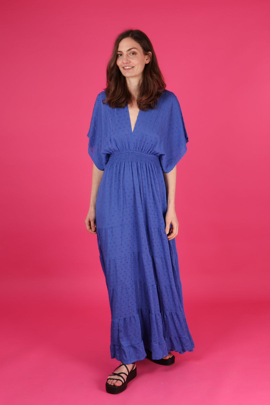 model wearing a short sleeve maxi length kaftan dress with elasticated waist