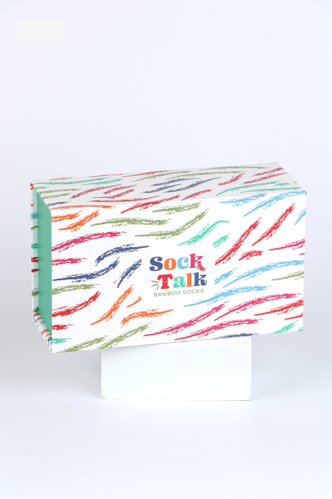 white sock talk gift box with an all over multicoloured brush stroke pattern