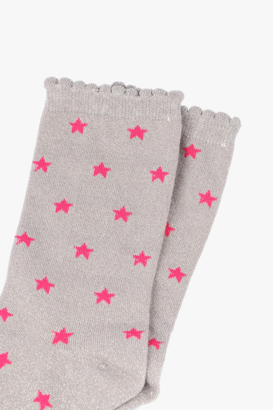 close up of the light grey and fuchsia pink star pattern ankle socks
