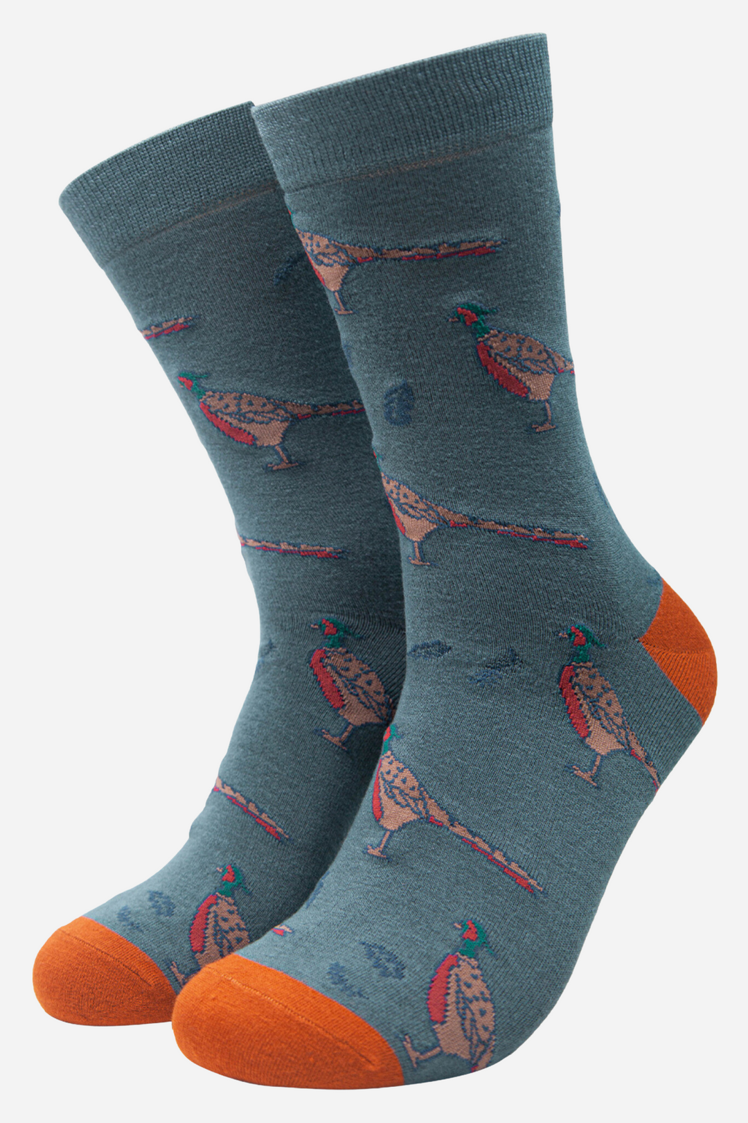 teal blue socks with woodland pheasants and  leaves