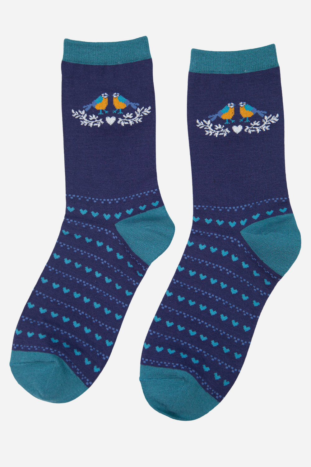 showing the blue tit motif of the ankle of the socks and the fair isle inspired love heart pattern