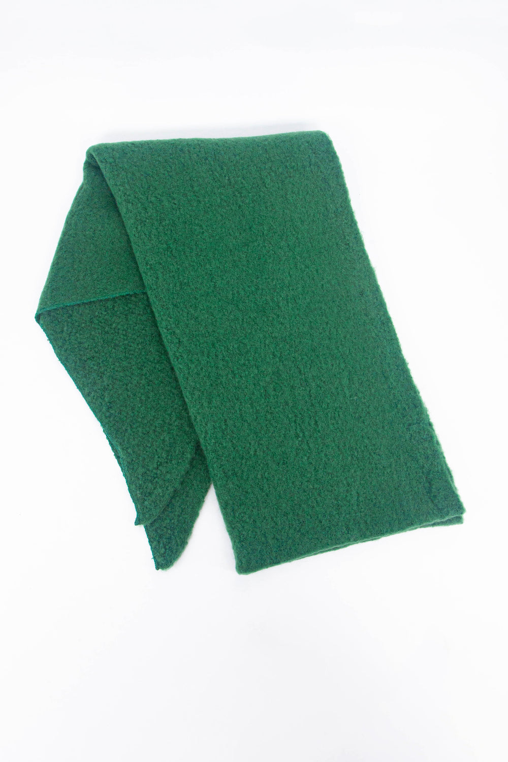 showing the scarf folded highlighting the solid green colour