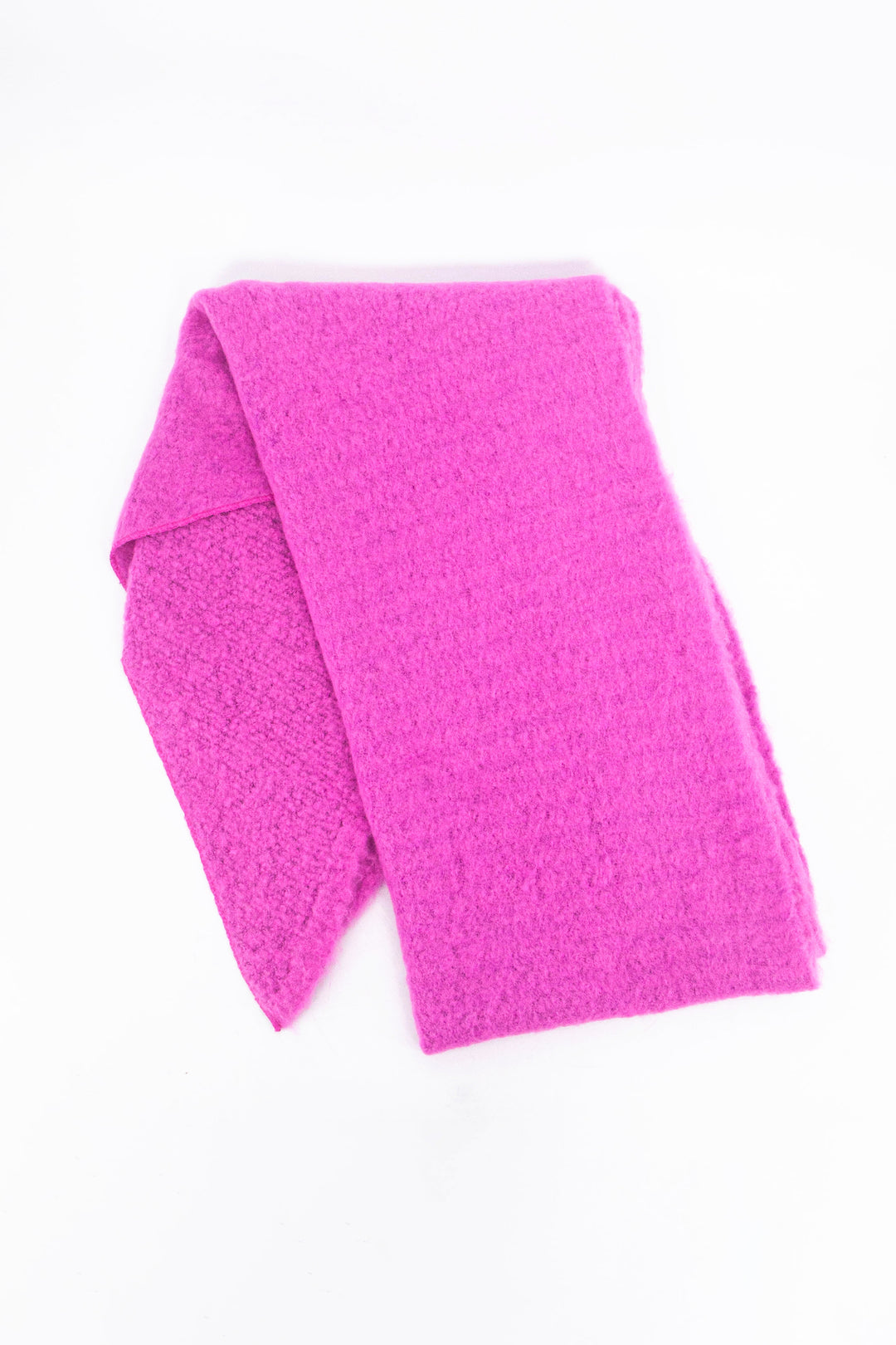 showing the scarf folded highlighting the solid plain hot pink colour