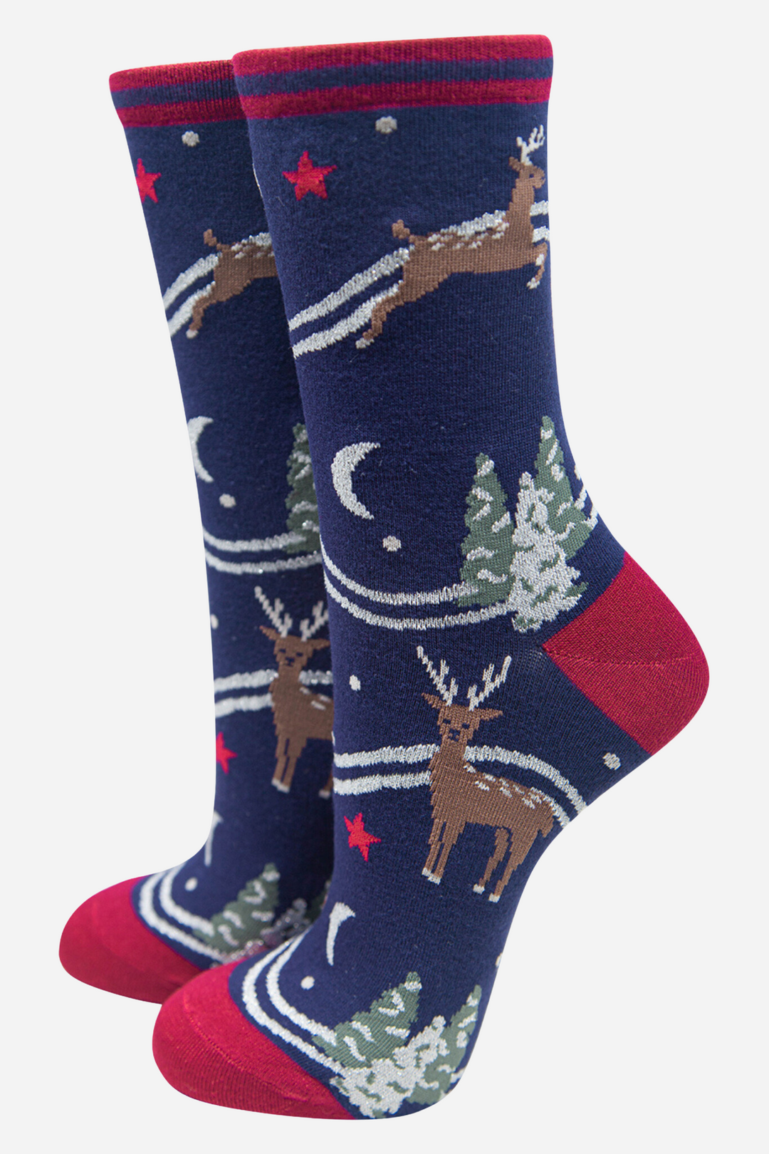 blue bamboo socks with burgundy heel, toe and cuff with a pattern of festive reindeer, snowy christmas trees and stars