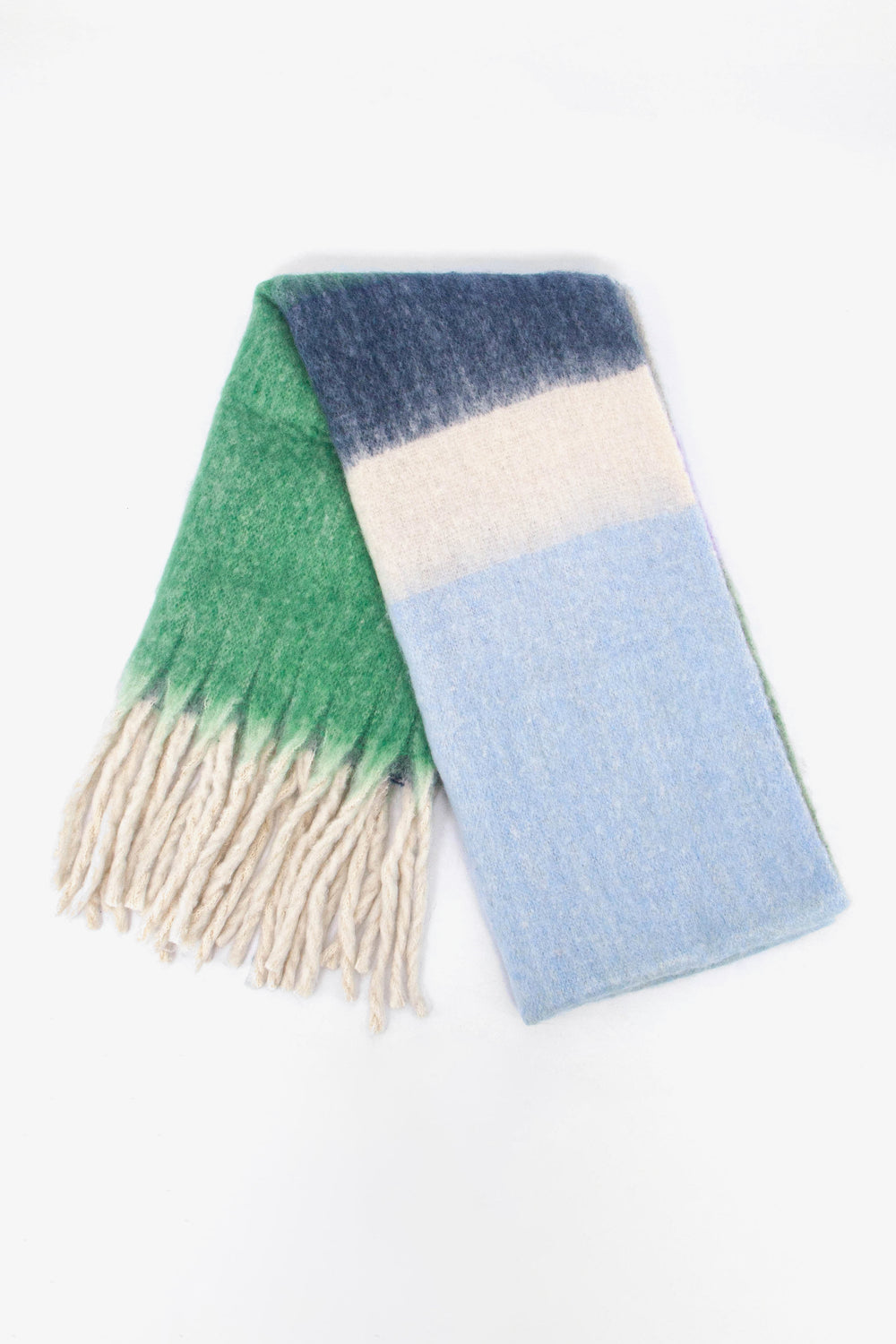 showing the scarf folded while laying flat, the colour block stripe pattern is highlighted. there are blue, cream and green tones visible in the design.