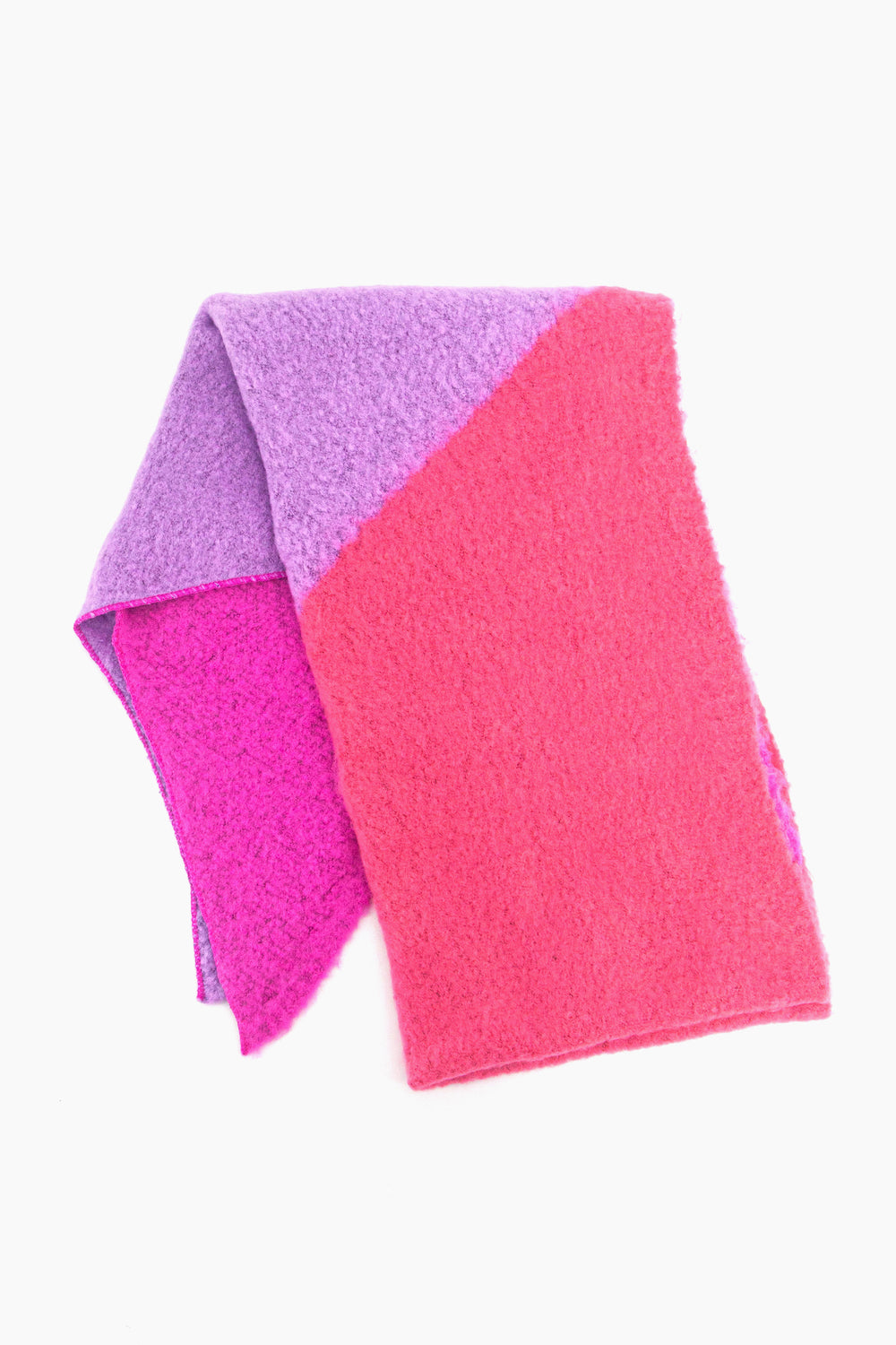 showing the asymmetric colour block scarf folder flat, showing the pink, lilac and fuchsia tones clearly