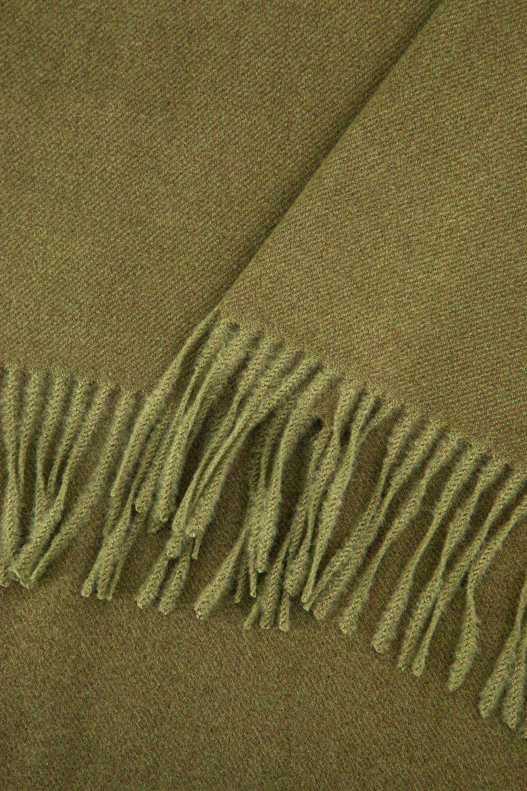 close up of the soft viscose knitted material of the winter blanket scarf