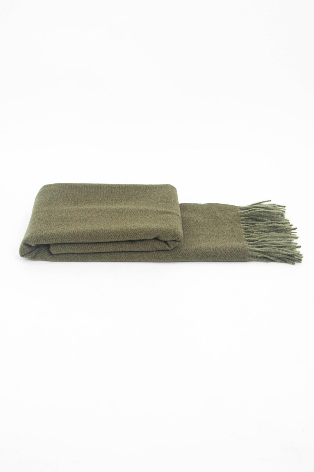 side view of the scarf when folder, showing the texture and thickness of the material. this scarf is warm and winter weight