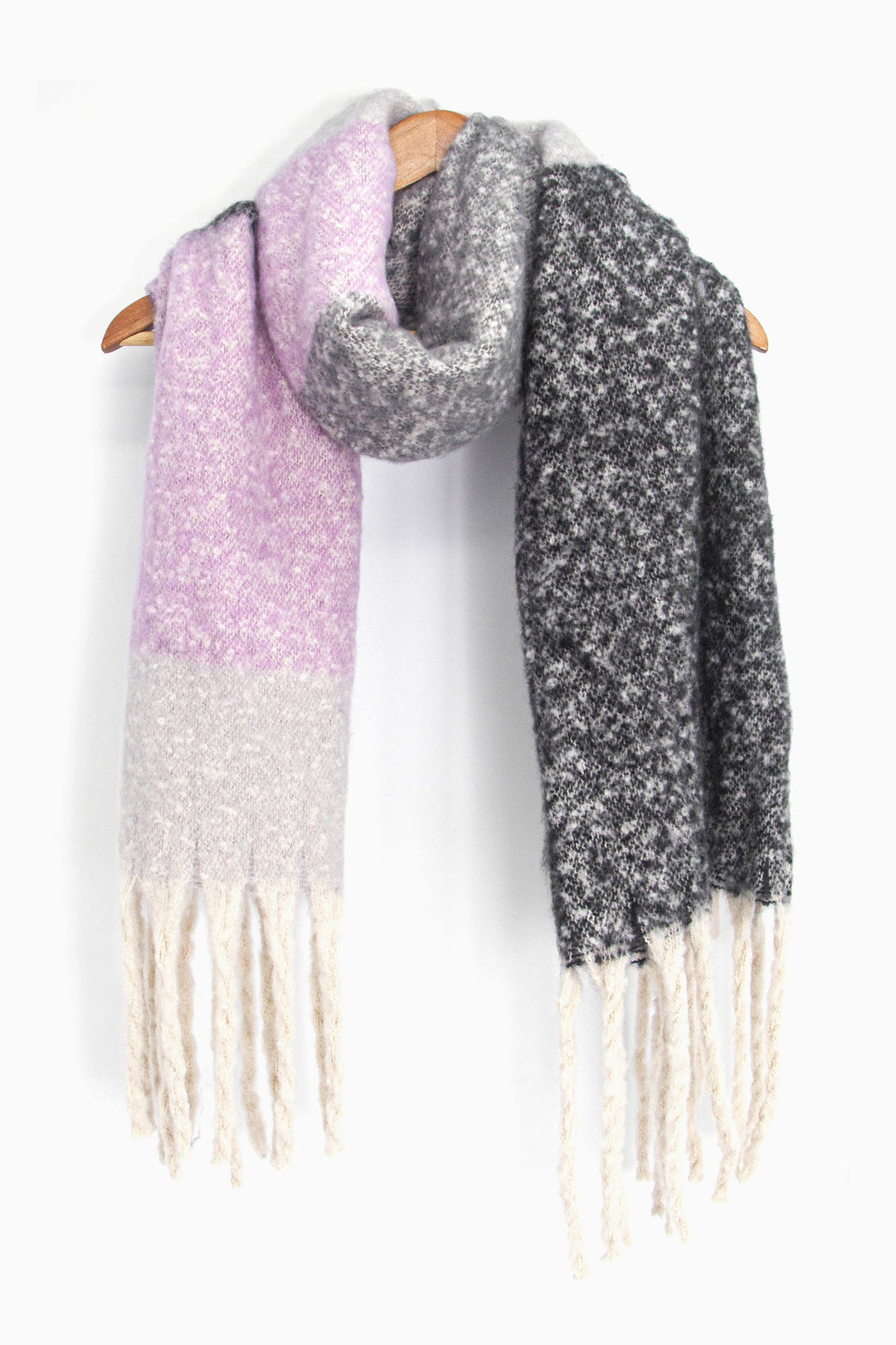 showing the grey and lilac colour block winter scarf draped around a coat hanger, showing how it would look when worn.