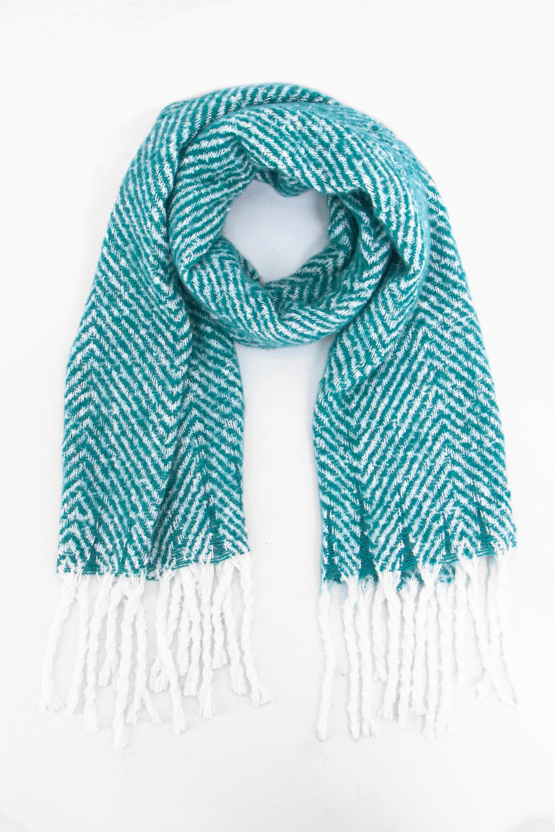 turquoise herringbone pattern knitted winter scarf with a contrasting white tassel trim