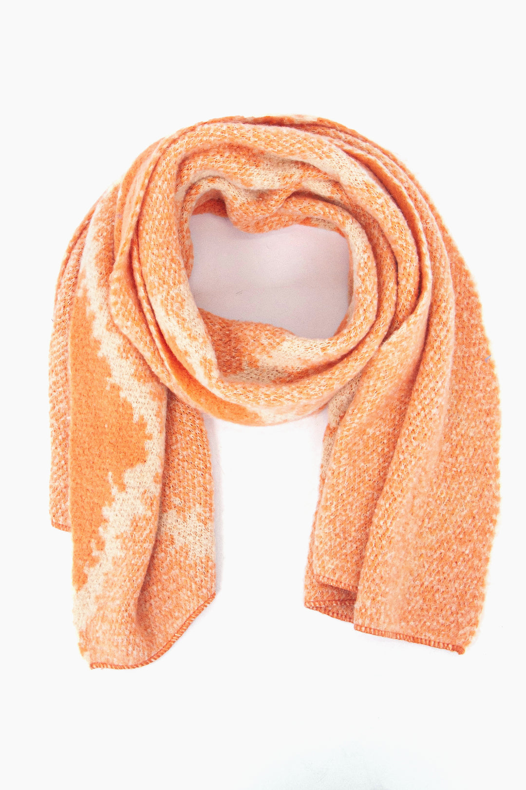 pastel orange scarf with a bold crosshatch pattern, the scarf is asymmetrical