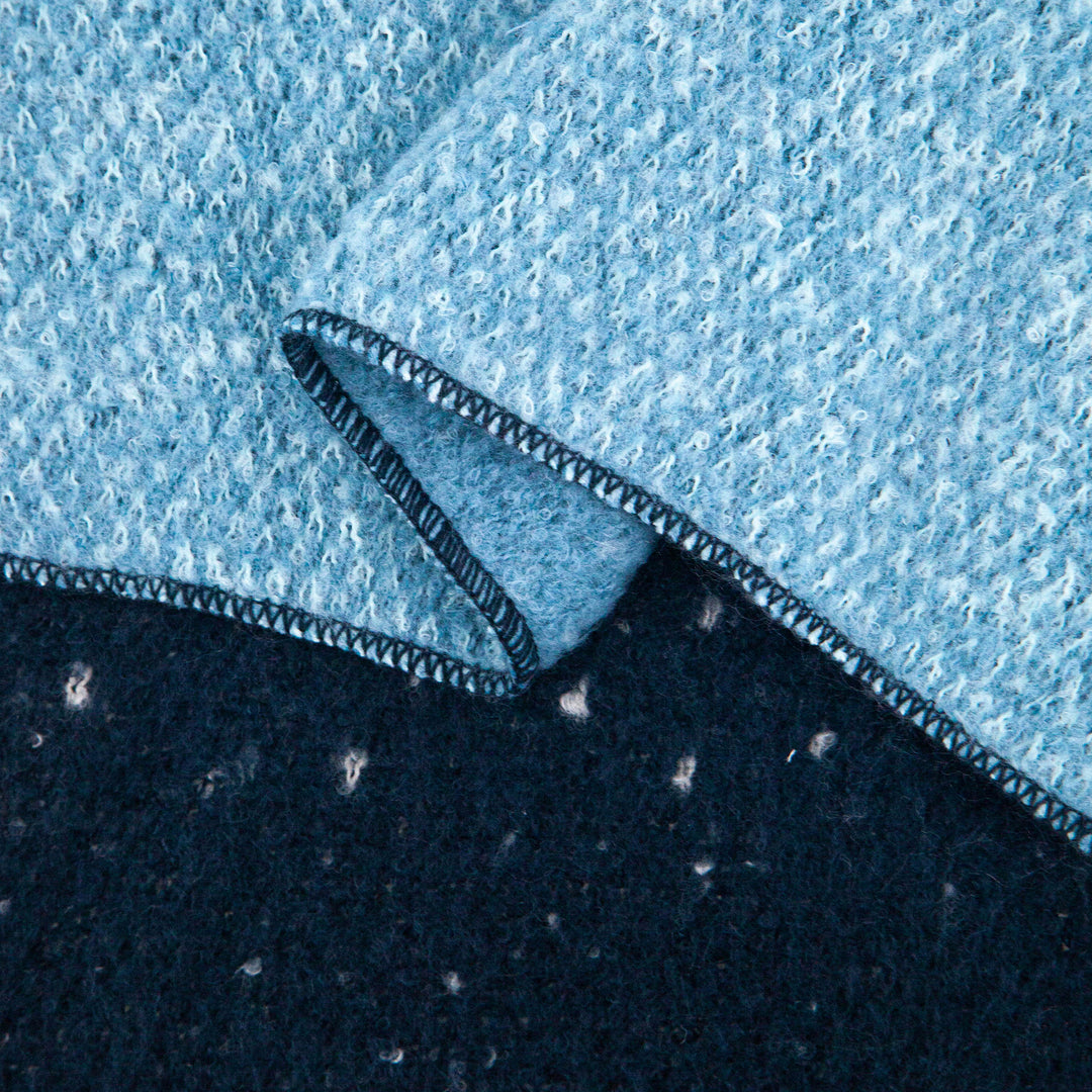 close up of the soft viscose knitted material of the winter blanket scarf