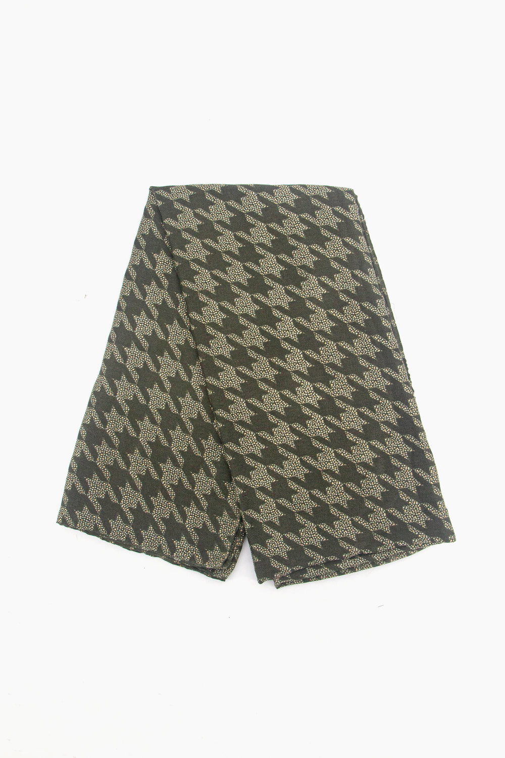 showing the scarf folded, the khaki green design with the glittery houndstooth pattern is shown to cover the whole piece.