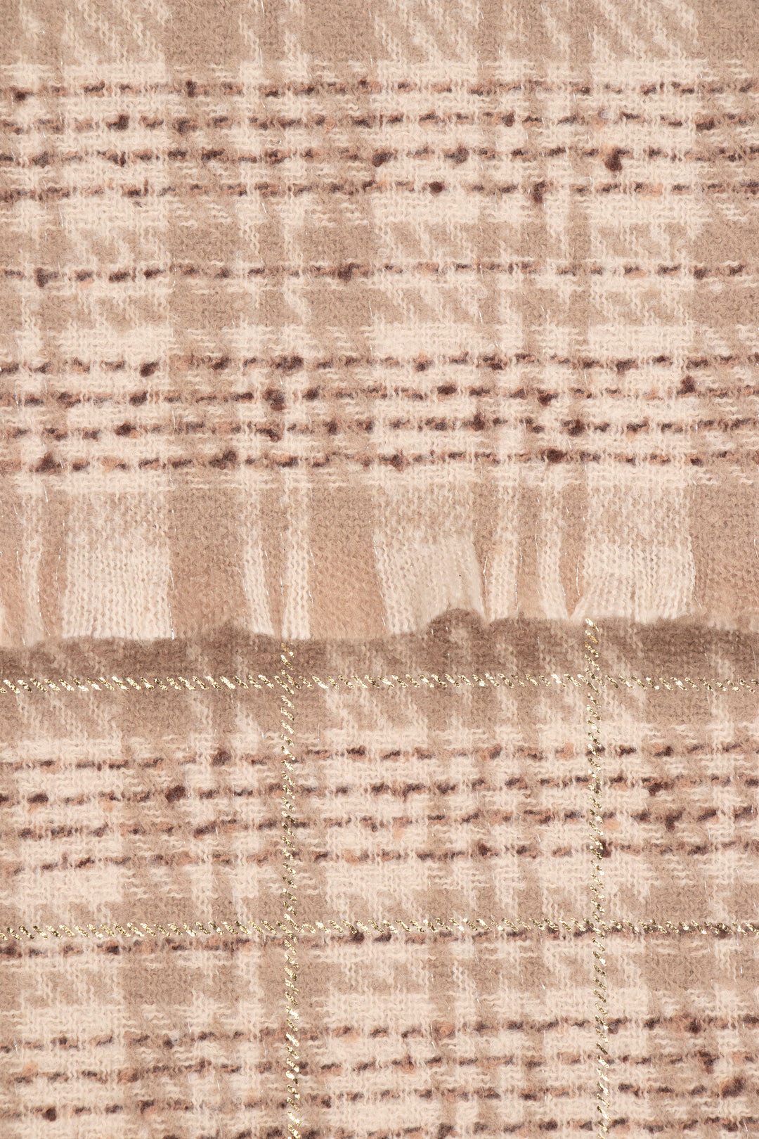 close up of the soft viscose fabric, the cream and beige check pattern is shown.