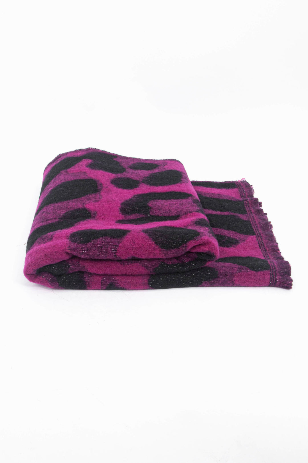 side view of the scarf when folded, showing the texture and thickness of the material. this scarf is warm and winter weight