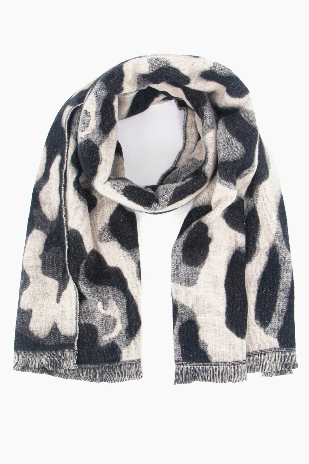 cream and black bold animal print winter scarf with a touch of sparkly silver glitter woven throughout