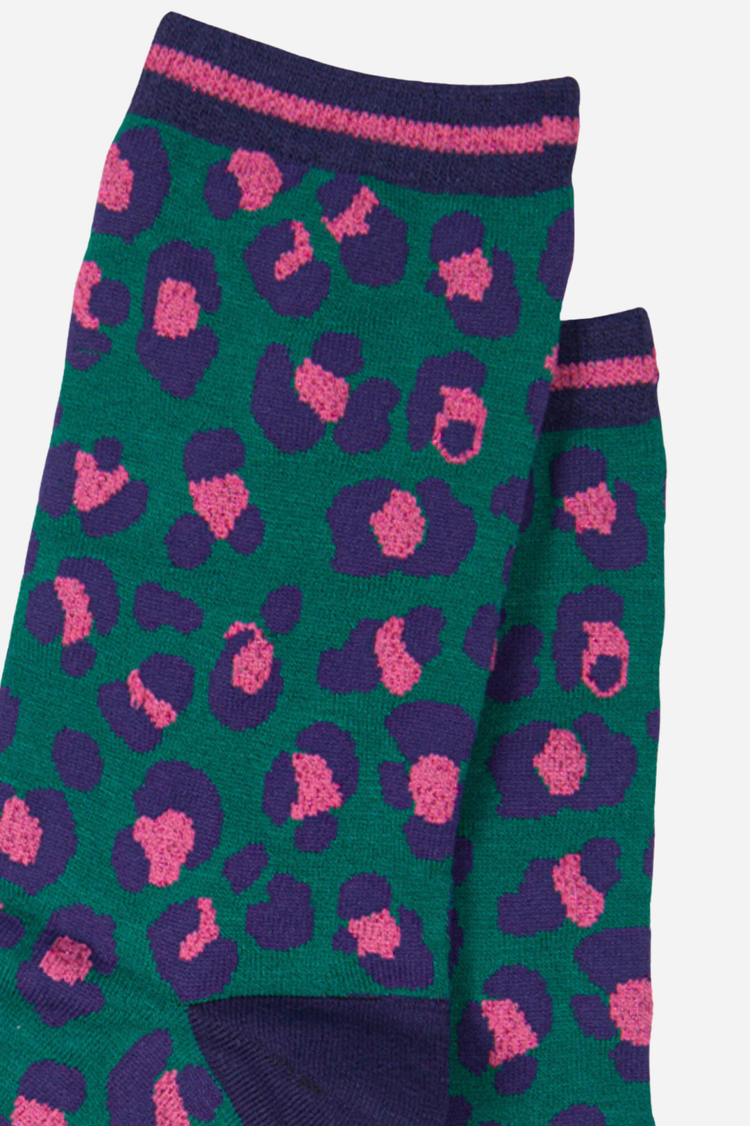 close up of the pink and green leopard print pattern