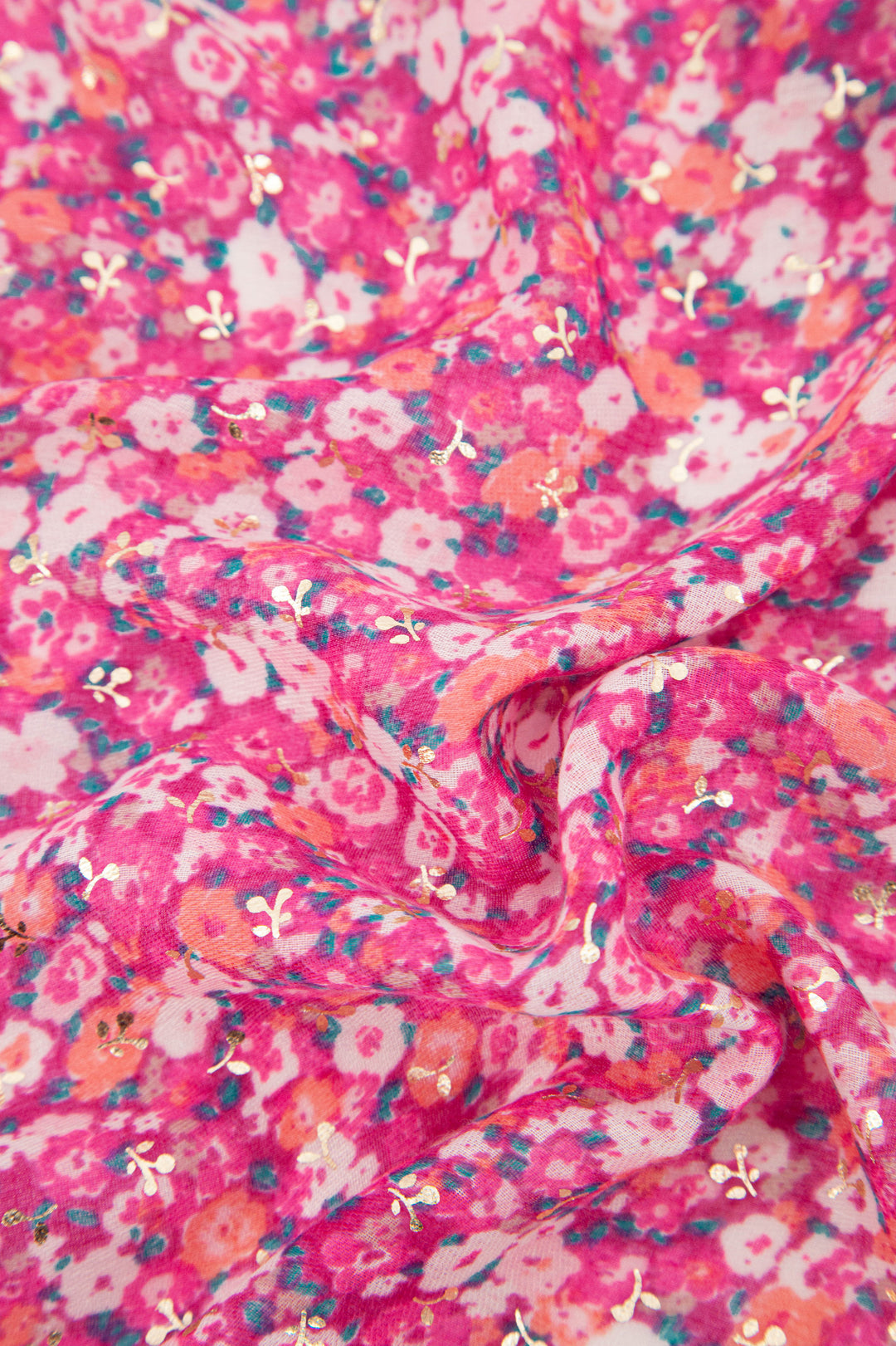 close up of the fuchsia pink floral print and lightweight material
