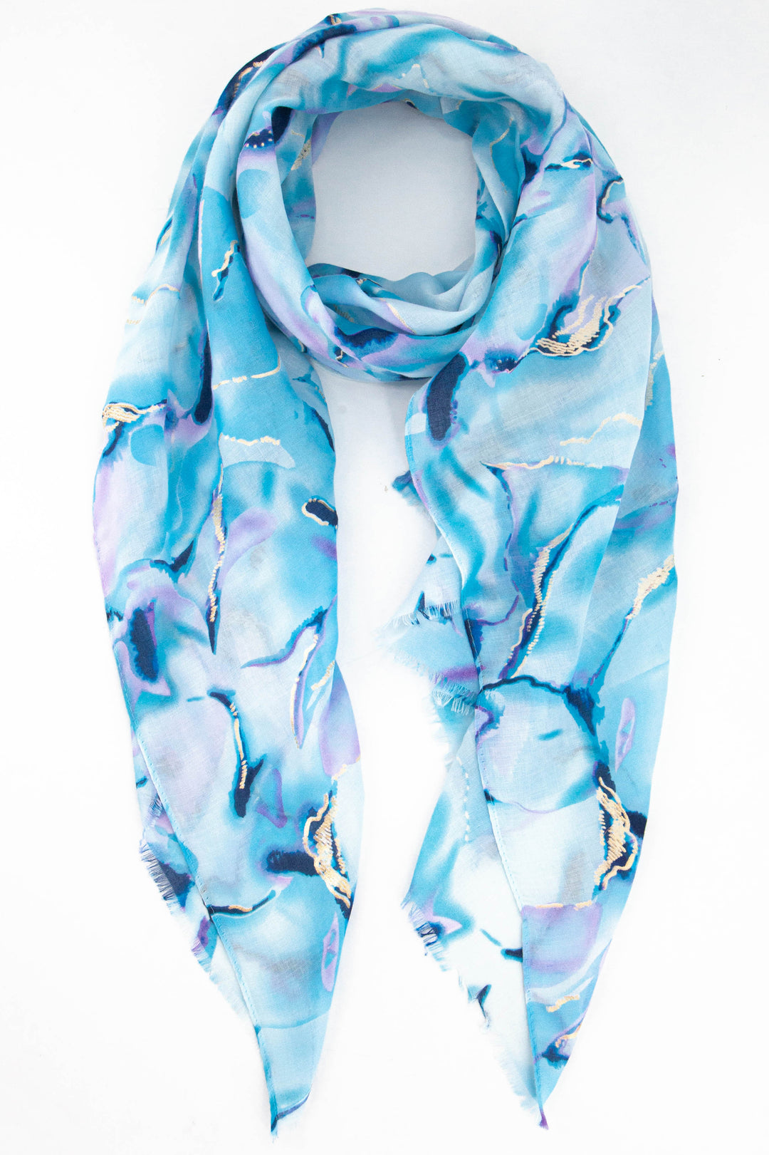 blue tie dye scarf with gold foil accents throughout, the tie dye is in a wave print