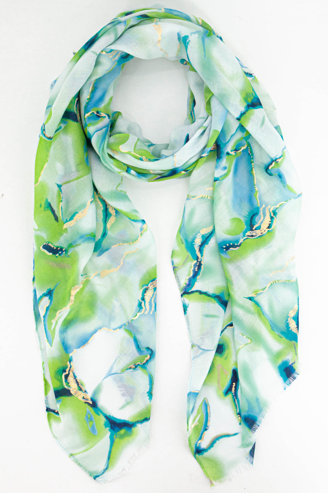 green tie dye scarf with gold foil accents throughout, the tie dye is in a wave print
